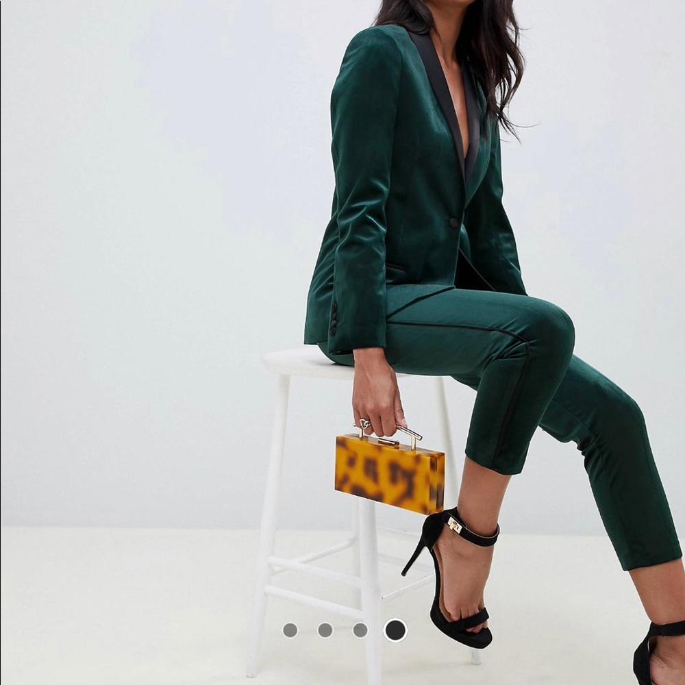 Green velvet tux (pants and jacket sold together). Never worn.